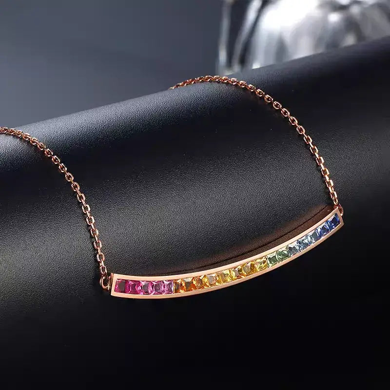 Aureline-Jewelry NOZBO 18K Gold Colored Sapphire Rainbow Smile Necklace