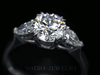 Aureline-Jewelry Three-Stone 1 Carat Round Diamond With Pear Side Stones Ring 18K Gold