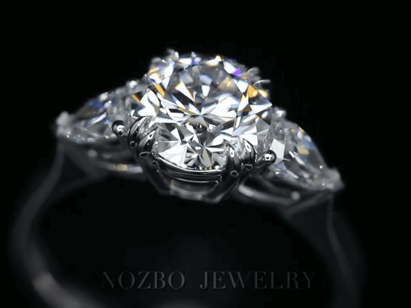 Aureline-Jewelry Three-Stone 1 Carat Round Diamond With Pear Side Stones Ring 18K Gold