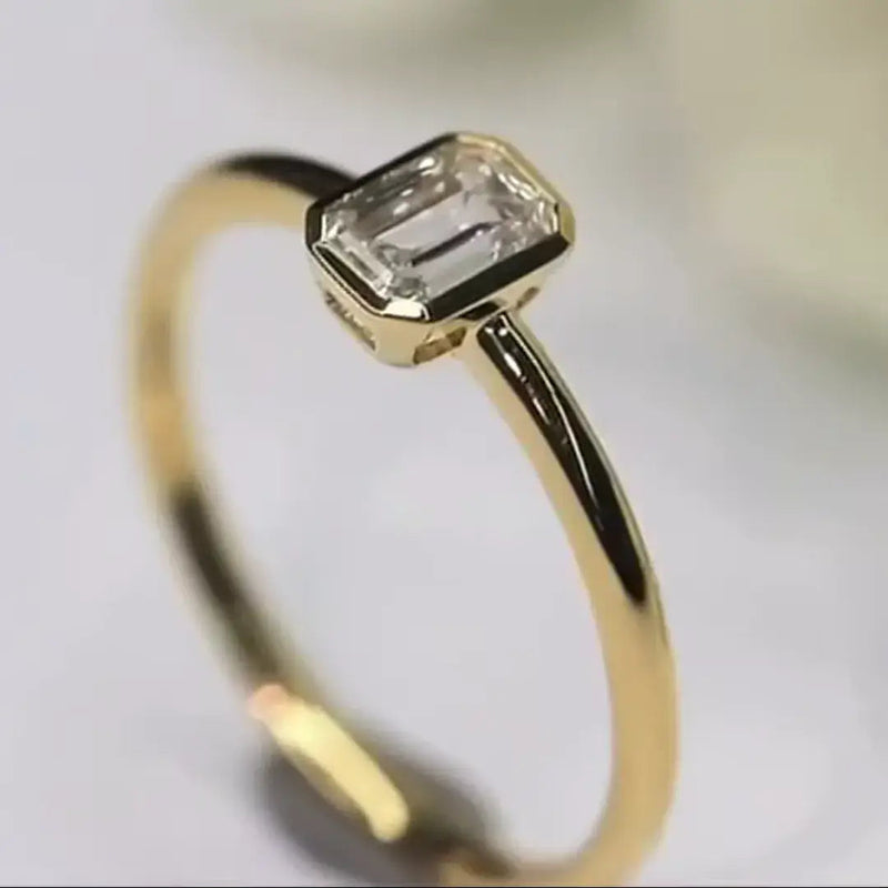 Aureline-Jewelry 0.5 CT Emerald Cut Lab Diamond Bezel Ring