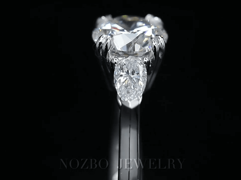 Aureline-Jewelry Three-Stone 1 Carat Round Diamond With Pear Side Stones Ring 18K Gold
