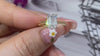 Aureline-Jewelry 2 CT Emerald Cut Lab Diamond Two-Tone Hide Halo Ring